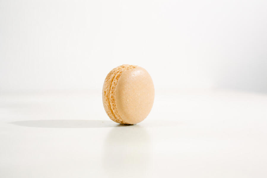 Moringa macaron, green shell, on linen
